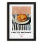 Galette Bretonne – on Striped Tablecloth, French Pastry Print, in sleek black frame