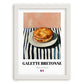 Galette Bretonne – on Striped Tablecloth, French Pastry Print, placed in minimal white frame