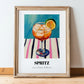 Spritz – on Striped Tablecloth, Italian Cocktail Poster, in wooden frame leaning on the floor