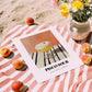 Pisco Sour – on Striped Tablecloth, Peruvian Spirit Wall Print, unframed on coastal sand
