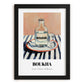 Boukha – on Striped Tablecloth, Tunisian Wine Still Life, in sleek black frame