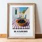 Blackberry – White village Street Café Scene, Berries Print, in wooden frame leaning on the floor