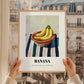 Banana – on Striped Tablecloth, Fruit Wall Decor, styled in a charming Paris street view