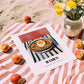 Ramen – on Striped Tablecloth, Japanese Pasta Poster, unframed on coastal sand