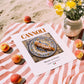 Cannoli – Italian Dessert Dish, Brasserie Wall Art, unframed on coastal sand